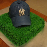 Yankees Baseball Cap I made this as my brother's Grooms cake. This was my first time making a baseball cap. It wasn't as hard as i thought it would be...