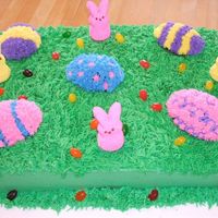 Marbled Cake W/buttercream Frosting, Jelly Beans & Peeps This cake was made for the staff at my son's school. Marbled cake with buttercream frosting. The eggs are chocolate cake. Peeps &...