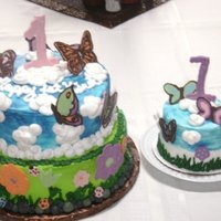 1St Birthday Cake I made this cake for my daughter's first birthday party. It is iced in buttercreme with chocolate decorations I made myself. It was my...