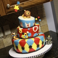 Circus Themed Topsy Turvy This cake was made for my daughter and son's joint circus themed birthday party (2 and 3 years old). It's my first topsy turvy...