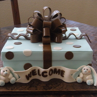 Blue And Brown Bunny Present White cake with buttercream and strawberry jam filling. Fondant and gumpaste decorations. What do you think? My 1st attempt at a gift box,...