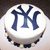 Yankee Cake Yankee logo cake. WASC with chocolate mousse filling and buttercream. Accents in fondant.