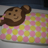 Polka Dot Monkey Face French Vanilla cake with vanilla mousse. Fondant Monkey and accents. This was the first cake that I carved and although it was pretty basic...