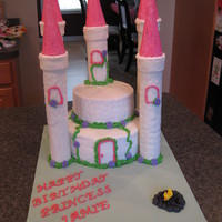Castle Cake Princess castle cake. 8" and 6" rounds, buttercream with cobblestone impression mat. Turrets were cardboard tubes covered with...