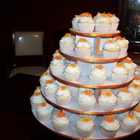 Autumn Themed Wedding Cupcakes/cake WASC cupcakes filled with chocolate mousse, frosted in vanilla buttercream and topped with gumpaste flowers.
