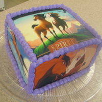 Spirit And Rain Birthday PhotoFrost frosting sheets printed with food coloring ink over white chocolate fondant-covered multi-flavored cake layers...dark chocolate...