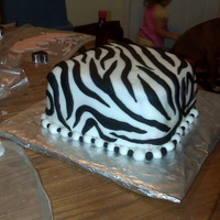 Zebra Stripe Fondant I love to paint and I decided to try cake decorating. This is my first fondant cake. I made a 4 layer (thin layers) red velvet cake with...