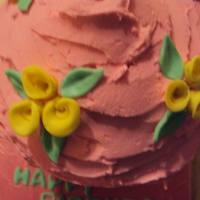 Pink & Yellow Roses Giant Cupcake Made with Wilton Giant Cupcake pan. Buttercream icing with fondant roses.