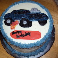 Hot Rod Car All buttercream icing except for the silver accents and the flames which are fondant.