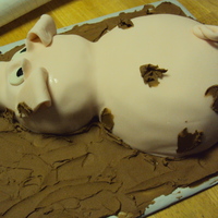 Pig In Mud Baked the body and the head in 2 different size Pyrex bowls, added the snout out of a small square of cake and shaped it a little. Covered...