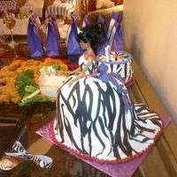 Princess Zebra print princess cake with sugar diamonds around the waste.