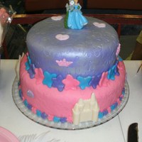 Isabella's Cinderella Birthday Cake I made this for my daughter's 4th birthday party. The bottom cake was a 4-layer chocolate cake with chocolate filling and the top cake...