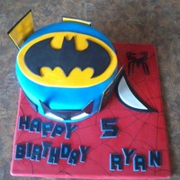 Batman/spiderman Cake Chocolate cake covered in fondant.
