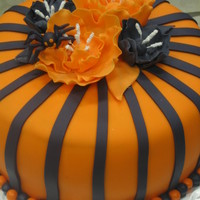 Fantasy Flower Halloween Cake My last Wilton cake class :-( But I decided not to do something in the book and came up with my own design! I thought it turned out pretty...