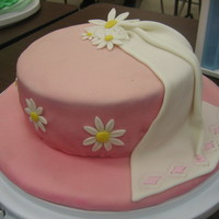 Wilton Level 4 1St Cake I left my cake in the car and the pink color faded :-( Oops. Won't ever do that again, thats what I get for being lazy. I'm not a...