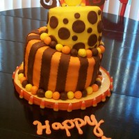 Happy Harvest This is my first time for fondant and attempting the topsy-turvy cake...there were a lot of prayers and crossed fingers during construction...