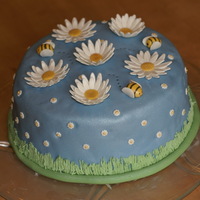 Dreaming Of Spring Was looking for an excuse to try out another cake...dinner with visiting family was a good one! I learned not to roll my fondant too thin...