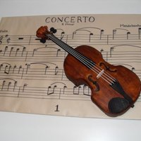 Violin And Sheet Music I made this cake for my grandfather's birthday. He has been playing violin for almost 80 years and loved his cake!