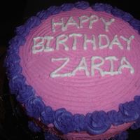 Zaria's Birthday Cake I made this cake for my daughter's birthday recently. It is a yello cake with chocolate ganache filling, the outside is buttercream.