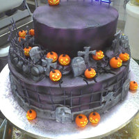 Grooms Cakes/nightmare Before Xmas cake is all bc with fondant and gumpaste accents...the groom had the cake topper for it ....tfl...