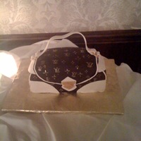 Louise Vuitton Cake Another first attempt at making a 3D purse cake. I got the idea from CC.