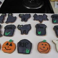 Halloween Cookies Halloween Cookies My 8 year old daughter and I made. The cookies are gingerbread and we used cream cheese frosting to decorate them.