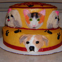 Salon De Pooch This is a layered red velvet cake with all buttercream frosting. I did you half marshmallows to give form for the snouts.