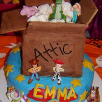 Toy Story 3 For Emma The bottom is a layered 10" white cake. The box is a layered chocolate cake covered with chocolate coated graham crackers for the...