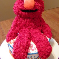 Elmo For Allie This is ALL cake with buttercream frosting. Gumballs for the eyes and a marshmallow for the nose covered in buttercream.