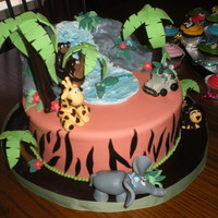 Safari Cake Safari theme all accents made from gumpaste and fondant.