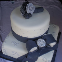 Bridal Shower Cake The top tier is carrot cake with cream cheese frosting and the botom is chocolate with mocha buttercream This photo there are still cotton...