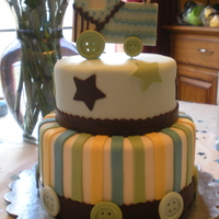Train Baby Shower Cake Design based off carter train theme. Top tier is chocolate with chocolate buttercream and the bottom is white cake with strawberry...