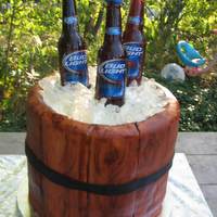 Sugar Beer Bottles/ice Barrel Cake My first time using fondant. Also made the sugar beer bottles and ice. I was quite impressed with myself on my first attempt. I rolled out...