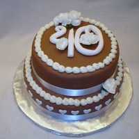 40Th Wedding Anniversary Cake Moist Devils Food Cake layered with Chocolate Ganache Mousse, covered in brown fondant.