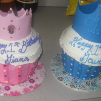 Giant Cupcake Cakes These were for twins first birthday. The blue cupcake was chocolate with chocolate mousse filling and the pink one was vanilla with...