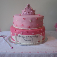 Tiara Birthday Cake This is a chocolate cake with chocolate mousse on the bottom and vanilla cake with raspberry filling on the top. The client wanted all pink...