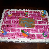 Handy Manny Cake This is a Handy Manny cake for a three year old boys birthday. It is a half sheet with cream cheese buttercream. Bricks we painted with...