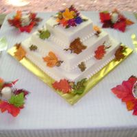 Autumn Wedding Autumn leaves & bouquet. Buttercream icing with fondant leaves. Red Velvet cake.