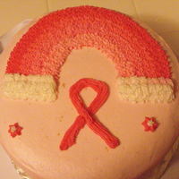 First Cake Wilton Course 1. This is my very first cake. Did not feel like doing the orginal rainbow so I decided since it is Oct I would do a Breast...