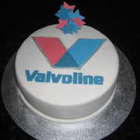 Valvoline Cake Made for my brother who has just started a new job with Valvoline.Rich fruit cake covered with white fondant. Details made in modelling...
