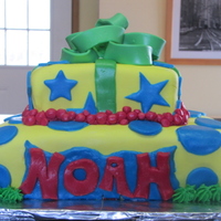 First "real" Cake I made this for a baby shower. I have never taken a class but am proud of my first "real" cake. It is a lime cake with coconut...