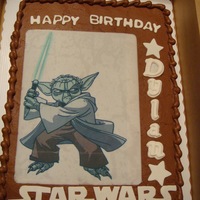 Star Wars Chocolate cream cheese buttercream with fondant accents. I maybe should have trimmed the image a bit but all in all the little boy loved...