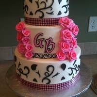 Pink Flowers WASC and filled with lemon and rasberry. Butter cream with fondant flowers