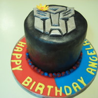 Autobot With Flower The lady I did this for loved Transformers and she always wore a flower in her hair. I surprised her with a personal autobot.