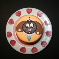 Dog Cake My 8 year old daughter decorated this cake ALL BY HERSELF! She even covered it in fondant alone. I showed her how on the cake that I was...