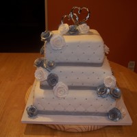 Silver Anniversary Cake Silver anniversary cake - all MMF with diamond quilt pattern and silver dragees. Fondant roses. Thanks for looking!