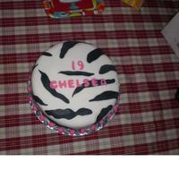 Zebra Print Birthday Cake This is one of the two first fondant cakes that I have made (I made two cakes in one day the first time). It is a vanilla cake with pink...