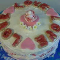 Valentines Day My mom made most of the cake i just made sure i looked alright. It has coconut in between the two layers.