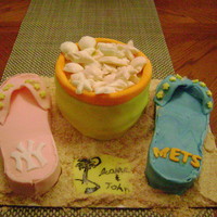 Beach Anniversary Cake This was for my mom and dads wedding anniversary. They were married on a boat and I saw the sandals here on cc.