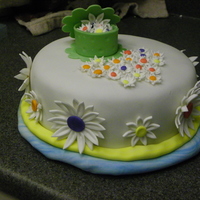 Daisy Cake This was the last cake I did in my Wilton Classes. Those daisies took a lot of time to make and put on, but I like the way it turned out!...